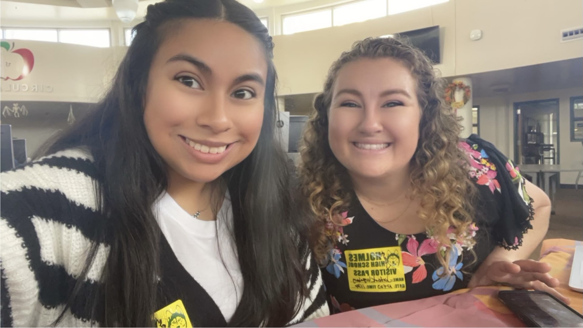 Two young women taking a selfie at the NISD open Enrollment event