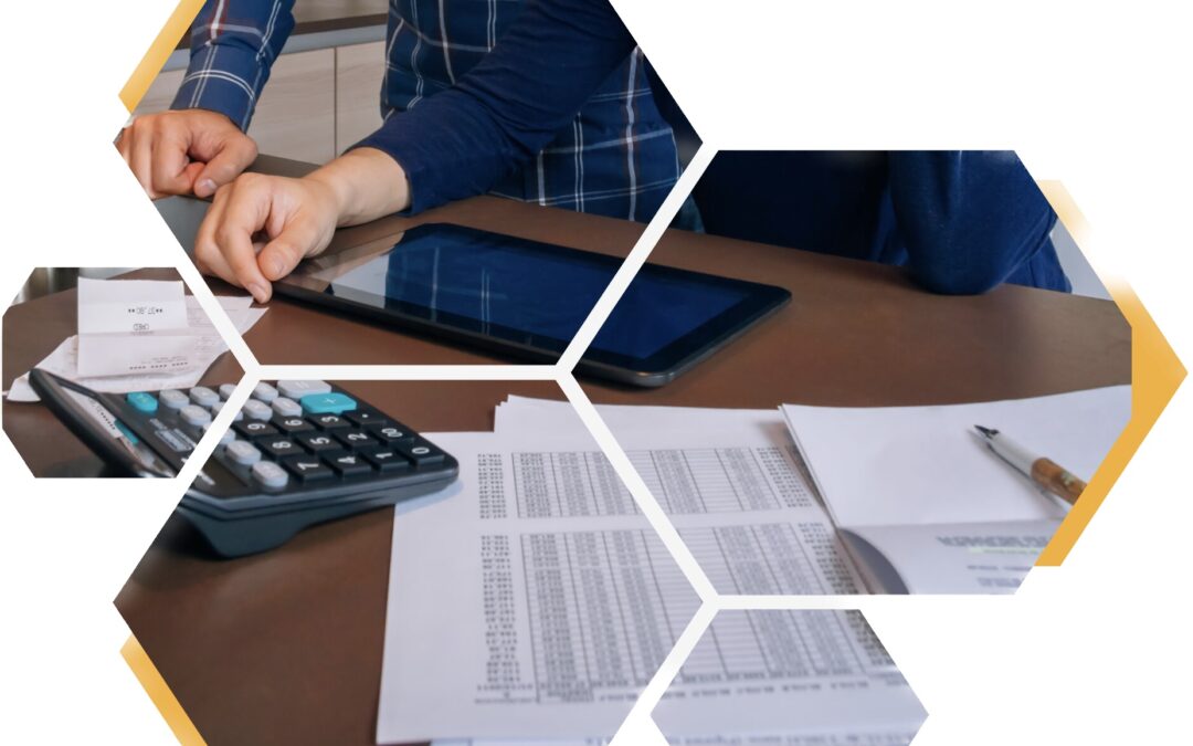 two people are looking at financial documents